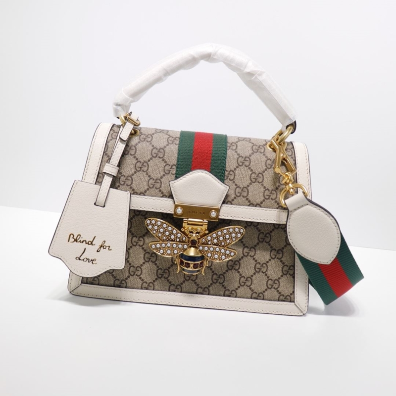 G*u*i top handle bags